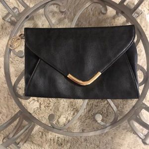 Black leather clutch bag